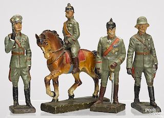 Four Lineol painted composition soldiers