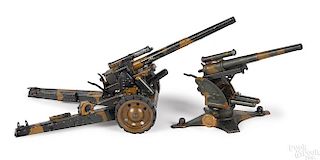 Two camouflage painted tin German field guns