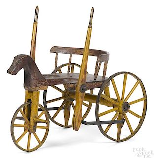 Hand propelled carved and painted horse velocipede