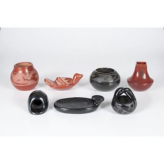 Assortment of Santa Clara, San Ildefonso, and Navajo Pottery Jars