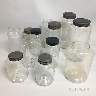 Twelve Colorless Blown Glass Apothecary Jars