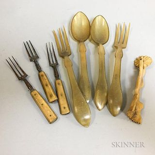 Four Horn Spoons and Forks, Three Bone-handled Forks, and a Bone Jagging Wheel.  Estimate $100-150