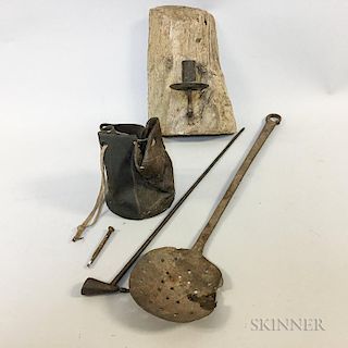Iron Pipe, a Skimmer, a Leather Pouch, and an Iron Candleholder.  Estimate $50-75