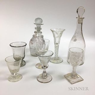 Eight Colorless Blown Glass Wines and Decanters