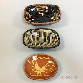 Three Reproduction Redware Pottery Dishes.  Estimate $50-75