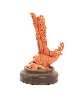 A Chinese Carved Coral Figure of Shoulao, Height 5 1/4 inches.