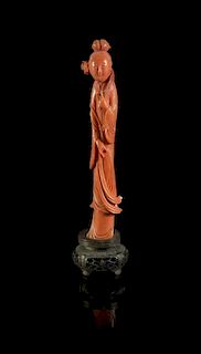 A Carved Coral Figure of a Lady, Height 4 1/2 inches.