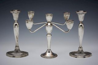 Grouping of three sterling silver candlesticks
