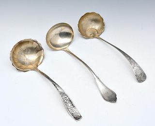 Grouping of three sterling silver ladles