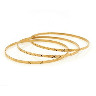 Three 18k Yellow gold bangle bracelets