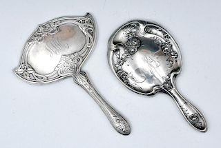 Two sterling silver art nouveau hand mirrors