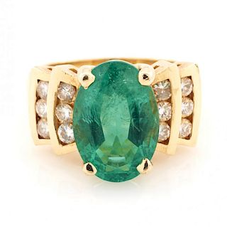 14k Yellow gold emerald and diamond ring