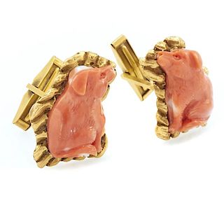 14k Yellow gold and coral pig cufflinks.