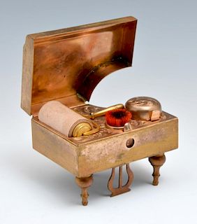 Piano shaped box with set of writing implements