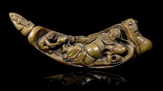 A Chinese Carved Horn Figural Composition, Width at widest 9 inches.