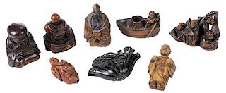 Eight Carved Wood Netsuke Figures