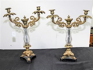 A Pair of Gilt Metal and Glass Candelabra Height of taller 18 inches.