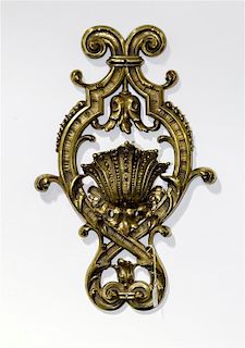 A Brass Applique Height 23 x width 14 1/2 inches.