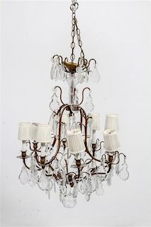 * A Continental Eight-Light Chandelier Diameter 25 inches.