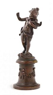 * A Continental Bronze Figure of a Cherub Height 6 5/8 inches.