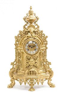 * A Neoclassical Gilt Metal Mantel Clock, Imperial Height 23 3/4 inches.