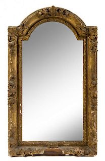 * A Continental Giltwood Mirror Height 47 x width 28 inches.