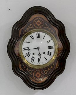 A Victorian Wall Clock Height 23 inches.