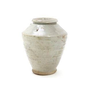 A Chinese Celadon Glaze Stoneware Jar, Height 8 inches.