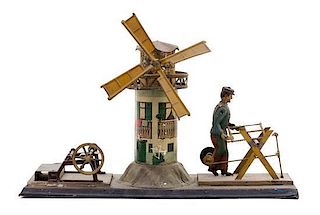 * A German Tin "Windmill and Saw Horse" Toy Height overall 9 inches.