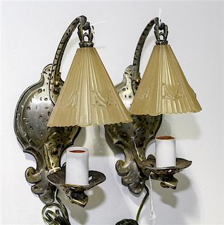 A Group of Six Sconces Height of first pair 11 3/4 inches.