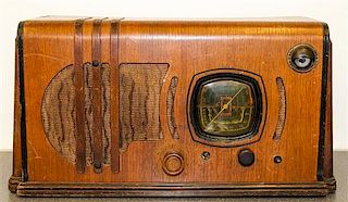 An Art Deco Table Top Radio, FADA Width overall 19 1/2 inches.