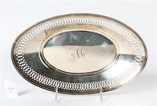An American Silver Bread Tray, Gorham Mfg. Co., Providence, RI, 1913, having a reeded rim with a pierce decorated border and 