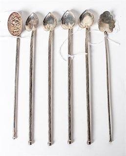 A Set of Four Mexican Silver Iced Tea Spoons, , having a spade-form bowl with a twist handle, together with an associated Mex