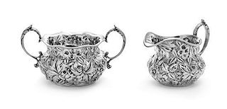 * An American Silver Creamer and Sugar Set, Jacobi & Jenkins Co., Baltimore, MD, early 20th century, each worked with floral 