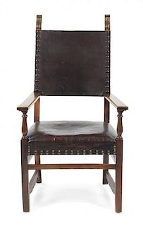 A Continental Renaissance Revival Armchair Height 53 1/4 inches.