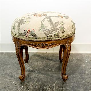 A French Provincial Stool Height 18 x width 17 1/2 inches.