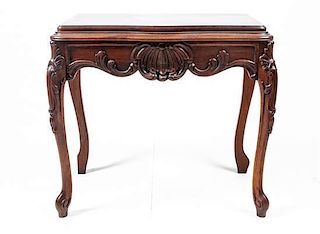 *A Louis XV Style Mahogany Table Height 28 3/4 x width 30 1/2 x depth 17 3/4 inches.