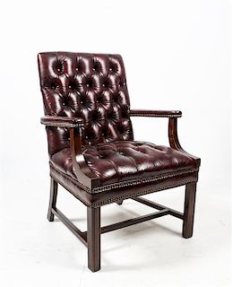A Georgian Style Leather Upholstered Armchair Height 37 inches.