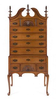 A Chippendale Style Maple Highboy Height 80 x width 37 x depth 22 inches.