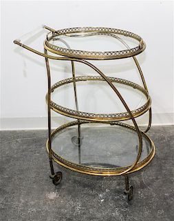 A Brass and Glass Bar Cart Height 32 1/2 x width 24 x depth 20 inches.