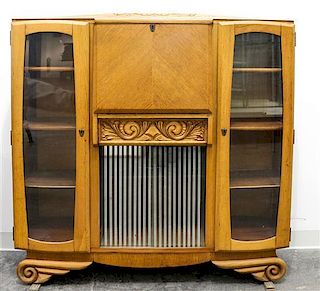 An Art Deco Fall Front Secretary Bookcase Height 47 3/4 x width 48 x depth 16 inches.