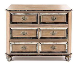 A Cerused Oak and Mirrored Glass Chest Height 34 1/2 X width 44 x depth 20 1/2 inches.