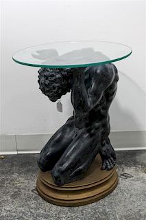 A Design Toscano End Table Height 21 x diameter of glass top 16 inches.