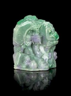 * A Carved Apple Green, Lavender and Celadon Jadeite Mountain Height 6 1/4 inches.