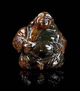 * An Amber Budai Carving Height 4 inches.