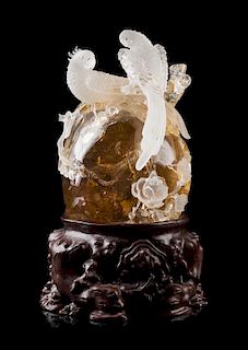 * A Rock Crystal Carving of Two Parrots Height of sculpture overall 15 1/2 inches.