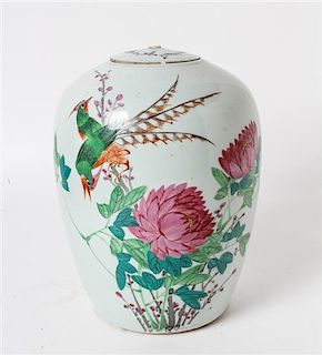 * A Chinese Famille Rose Porcelain Covered Jar Height 11 inches.