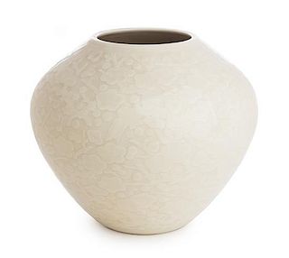 A Chinese White Porcelain Jar Height 8 inches.