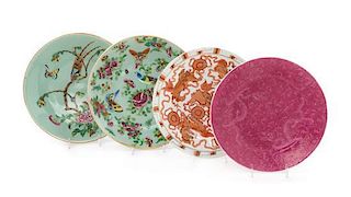 Four Porcelain Plates Diameter of largest 9 3/4 inches.