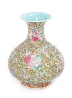 A Gilt Decorated Famille Rose Porcelain Vase Height 7 1/4 inches.